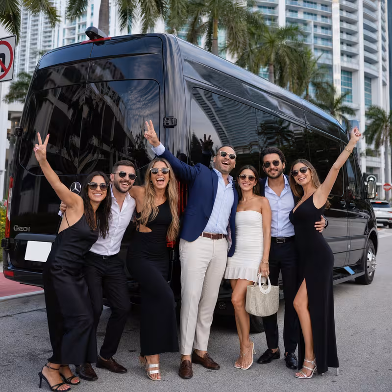 Group boarding a white charter bus for Bachelor & Bachelorette Transportation transportation in Miami
