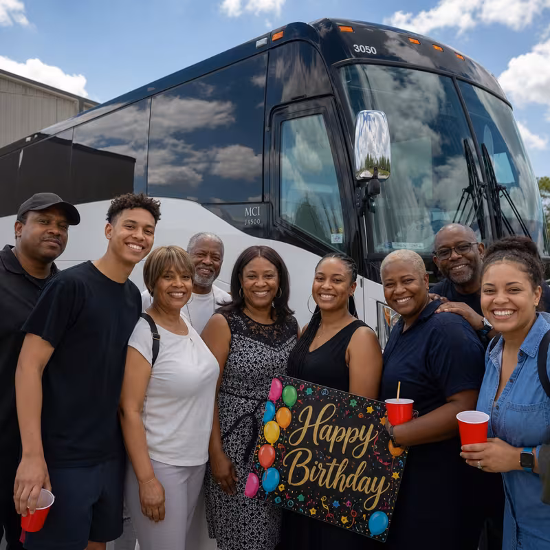 Passengers loading luggage while boarding a Miami group shuttle