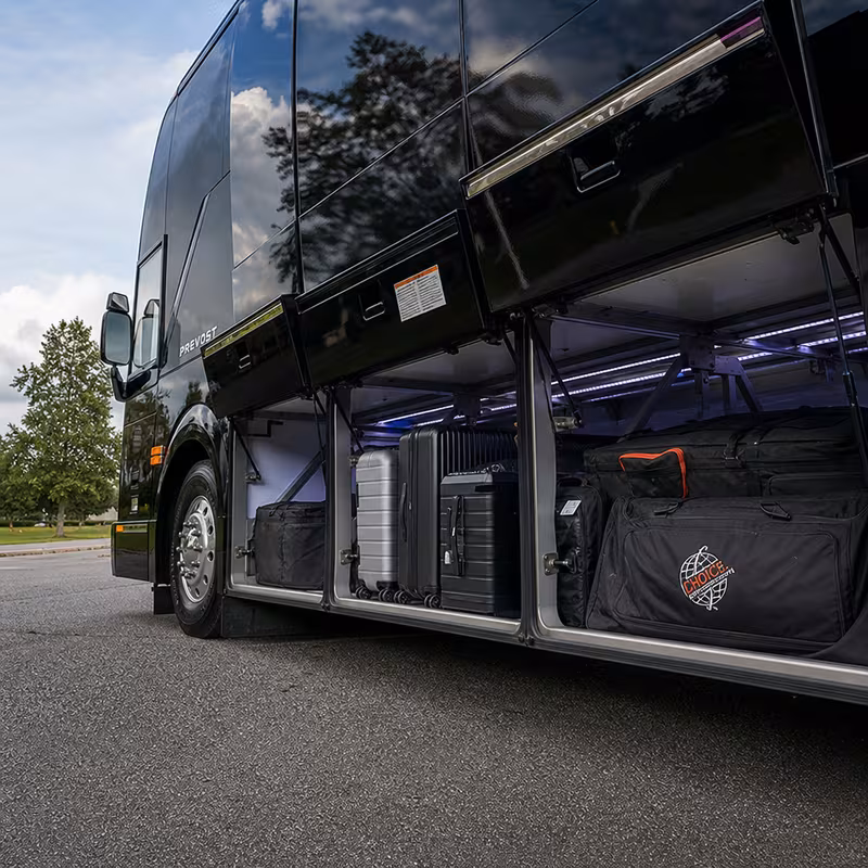 Party bus interior with wraparound leather seating and LED lighting in Miami
