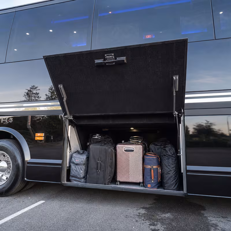 Party bus interior with wraparound leather seating and LED lighting in Miami